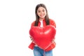 Cheerful lovely romantic teen girl hold red heart symbol of love for valentines day isolated on white background Royalty Free Stock Photo