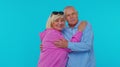 Cheerful lovely senior couple man woman grandparents smiling hugging enjoying lifestyle together Royalty Free Stock Photo