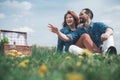 Cheerful loving couple having romantic picnic in the nature Royalty Free Stock Photo