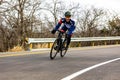 Cheerful male cyclist smiling at the camera during the Cedar Hill Race Festival