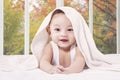 Cheerful male infant in the bedroom Royalty Free Stock Photo