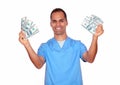 Cheerful male in nurse uniform holding cash money