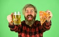 Cheerful man bearded hipster hold pizza. Hungry man going to eat pizza and drink beer. Perfect rest in pub. Finally