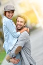 Cheerful man lifting his girlfriend Royalty Free Stock Photo