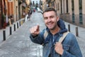 Cheerful man pointing at camera outdoors Royalty Free Stock Photo