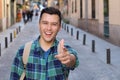 Cheerful man pointing at camera outdoors Royalty Free Stock Photo