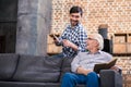 Cheerful man resting with his father Royalty Free Stock Photo