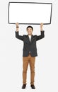 Cheerful man showing a blank white banner Royalty Free Stock Photo