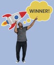 Cheerful man with a winner word and rocket