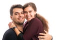 Cheerful man and woman couple close-up portrait hugging