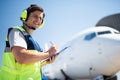 Cheerful man working at airport