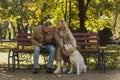 Cheerful mature couple with takeaway coffee Royalty Free Stock Photo