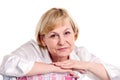 Cheerful mature woman over white background