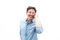 Cheerful middle aged guy talking on cell phone Royalty Free Stock Photo