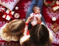 Mother and little children having fun in Christmas time. Top vie Royalty Free Stock Photo
