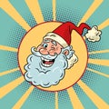 Cheerful mood for the winter holidays. New Year says hello. Santa Claus winks. Royalty Free Stock Photo