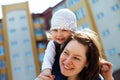 Cheerful mother and curly baby girl Royalty Free Stock Photo