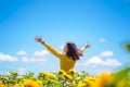 Cheerful multiracial Asian woman smiling with arms raised up. Royalty Free Stock Photo