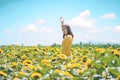 Cheerful multiracial Asian woman smiling with arms raised up. Royalty Free Stock Photo