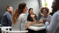 Cheerful multiracial business team people having fun eating pizza together Royalty Free Stock Photo