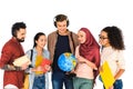 cheerful muslim woman holding globe and standing with multicultural group of people isolated