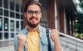 Cheerful nerd celebrating success in studies Royalty Free Stock Photo