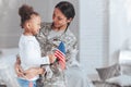 Cheerful nice woman wearing a military uniform