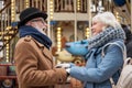 Cheerful old man and woman enjoying romantic date Royalty Free Stock Photo