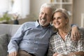 Cheerful old retired couple husband and wife enjoying leisure