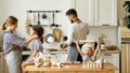 Happy family cooking together at home Royalty Free Stock Photo