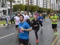 Cheerful people running in Limassol Marathon Corporate race, Cyprus