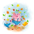 Cheerful pig in blue pants dancing and throwing autumn fallen leaves.