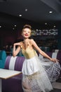 cheerful pin up waitress in dress Royalty Free Stock Photo