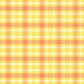 Cheerful plaid pattern in bright yellows soft peach. A classic, versatile texture. Use for backgrounds, textiles, design projects Royalty Free Stock Photo