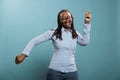 Cheerful pleased adult person vibing through dance while celebrating an important event. Royalty Free Stock Photo