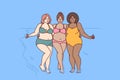 Cheerful plus size women dressed in swimsuit stand hugging on sunny beach near sea water Royalty Free Stock Photo