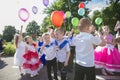 Cheerful preschool children at the graduation party in kindergarten