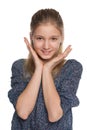 Cheerful preteen girl against the white Royalty Free Stock Photo