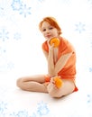 Cheerful redhead with two oranges Royalty Free Stock Photo
