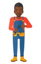 Cheerful repairman with spanner