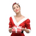 Cheerful retro girl holding christmas gift