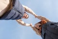 cheerful romantic couple dating and holding hands outdoors, sky background Royalty Free Stock Photo