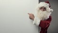 Santa Claus pointing at blank sign Royalty Free Stock Photo