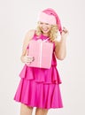 Cheerful santa helper girl with gift box Royalty Free Stock Photo