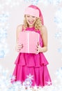 Cheerful santa helper girl with gift box Royalty Free Stock Photo