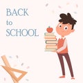 Back to school concept. Cheerful schoolboy holding books.