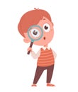 Back to school concept. Cheerful schoolboy holding magnifier.