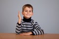 Cheerful Schoolboy ready to answer question