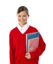 Cheerful schoolgirl holding books