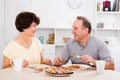 Cheerful senior couple having lunch Royalty Free Stock Photo